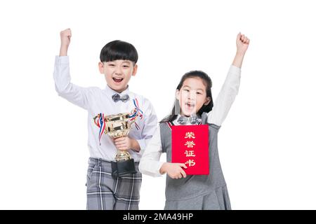 Happy pupils with a trophy and certificate Stock Photo