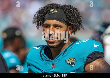 Jacksonville Jaguars linebacker Caleb Johnson (57) during the national  anthem before an NFL pre-season football game against the Miami Dolphins,  Saturday, Aug. 26, 2023, in Jacksonville, Fla. The Jaguars defeated the  Dolphins