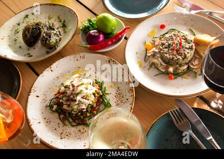 Calamari ceviche. The cebiche or ceviche is a dish consisting of fish marinated in citrus seasonings. Stock Photo