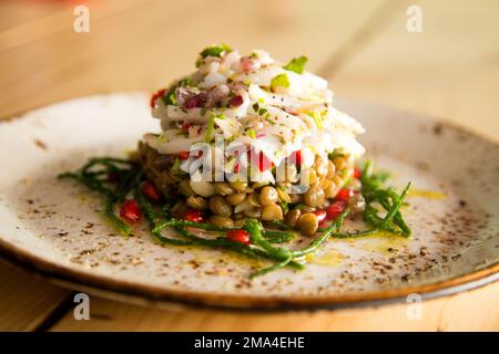 Calamari ceviche. The cebiche or ceviche is a dish consisting of fish marinated in citrus seasonings. Stock Photo