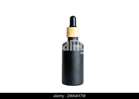 A dropper bottle with serum or gel isolated on white background. Beauty concept for face and body care. Skincare products, natural cosmetic. Black mat Stock Photo
