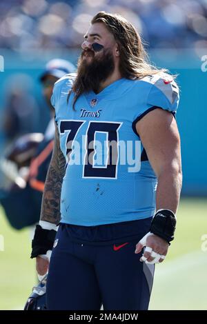 Tennessee Titans guard Jordan Roos (70) walks on the sideline in the ...