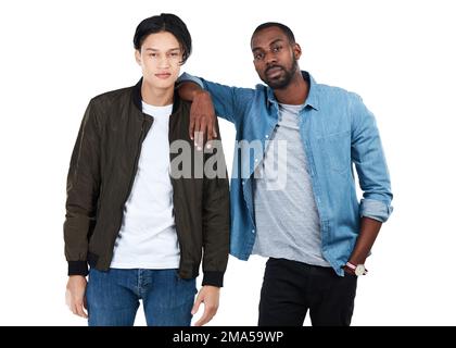 Two young men, studio portrait and friends at college for confidence, motivation or goals by white background. Isolated gen z students, black man and Stock Photo
