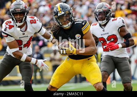 Pittsburgh Steelers' Chase Claypool catches a touchdown pass behind Tampa  Bay Buccaneers' Carlton Davis III (24) and Keanu Neal during an NFL  football game at Acrisure Stadium, Sunday, Oct. 16, 2022 in