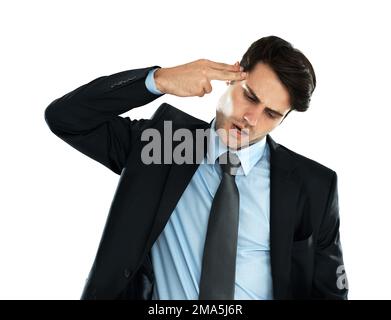 Business, man and gun gesture for depression, financial crisis and employee isolated on white studio background. Young person, male entrepreneur and Stock Photo