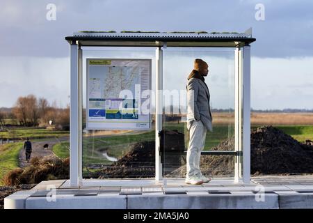 SCHERMERHORN - A man is waiting for the bus that never came. Thousands of bus drivers, drivers and conductors in regional transport will stop working on Thursday and Friday. ANP OLAF KRAAK netherlands out - belgium out Stock Photo