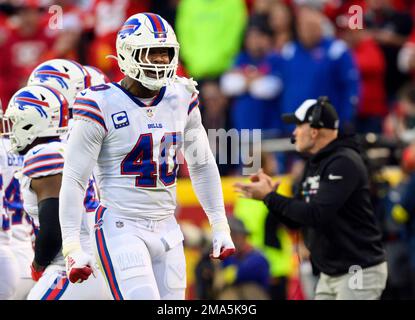 FILE - Kansas City Chiefs quarterback Patrick Mahomes (15) runs up field as  Buffalo Bills linebacker Von Miller (40) and linebacker Matt Milano (58)  pressure during an NFL football game Sunday, Oct.