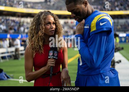 NFL Network reporter Kayla Burton, left, interviews Dallas Cowboys