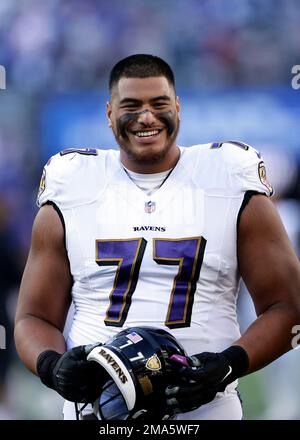 Baltimore Ravens offensive tackle Daniel Faalele (77) during the first half  of an NFL preseason football game against the Arizona Cardinals, Sunday,  Aug. 21, 2022, in Glendale, Ariz. (AP Photo/Rick Scuteri Stock