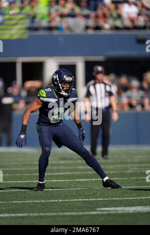 Seattle Seahawks cornerback Coby Bryant (8) walks off the field during an NFL  football game against the Las Vegas Raiders, Sunday, Nov. 27, 2022, in  Seattle, WA. The Raiders defeated the Seahawks