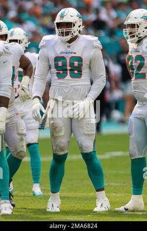 Miami Dolphins defensive tackle Raekwon Davis (98) walks on the