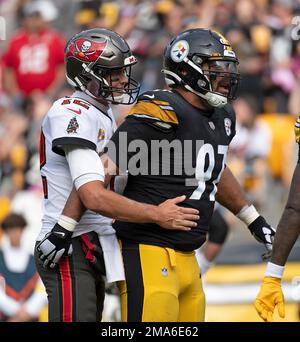 Pittsburgh Steelers defensive tackle Cameron Heyward (97) laughs as he  talks with Tampa Bay Buccaneers quarterback Tom Brady (12) after a play  during an NFL football game, Sunday, Oct. 16, 2022, in