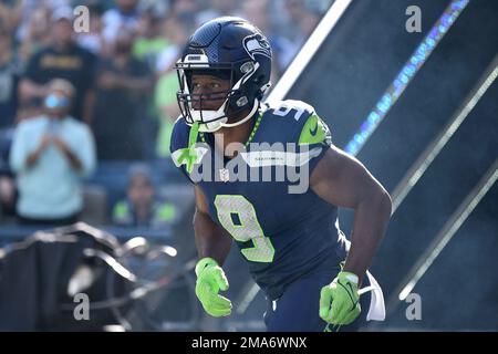 Seattle Seahawks running back Kenneth Walker III (9) runs during an NFL  wild card playoff football game against the San Francisco 49ers on Saturday,  Jan.14, 2023, in Santa Clara, Calif. (AP Photo/Scot