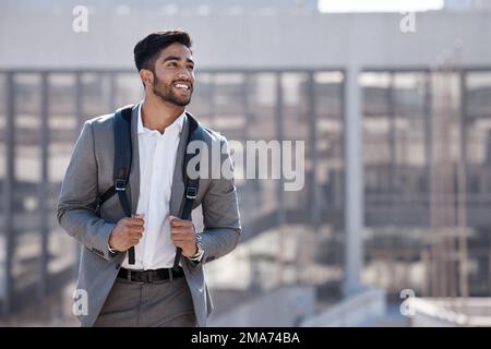 In the city of big dreams. a young businessman walking in the city. Stock Photo