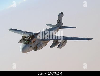A US Marine Corps (USMC) EA-6B Prowler, Marine Tactical Electronic Warfare Squadron 1 (VMAQ-1), Marine Corps Air Station (MCAS) Cherry Point, North Carolina (NC), conducts a mission over the Persian Gulf, as part of the war on terror during Operation ENDURING FREEDOM. Country: Persian Gulf Stock Photo