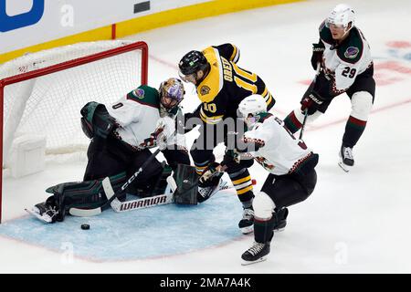 Boston Bruins' A.J. Greer (10) Defends Against Philadelphia Flyers ...