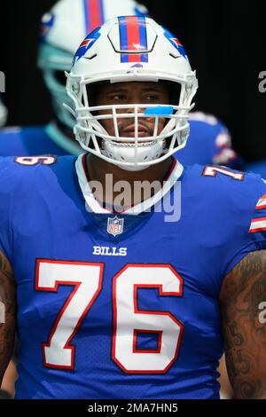 Buffalo Bills guard Rodger Saffold (76) prepares to walk onto the field  before the start of an NFL football game against the Miami Dolphins,  Sunday, Sept. 25, 2022, in Miami Gardens, Fla. (