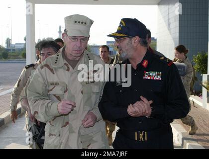 US Navy (USN) Admiral (ADM) Michael G. Mullen (foreground left), CHIEF of Naval Operations (CNO), talks with State of Kuwait Major General (MGEN) Ahmed Y. Al-Mulla, Commander, Kuwait Naval Force, during his New Years visit to the region. US Navy (USN) Admiral (ADM) Michael G. Mullen (foreground left), Chief of Naval Operations (CNO), talks with State of Kuwait Major General (MGEN) Ahmed Y. Al-Mulla, Commander, Kuwait Naval Force, during his New Years visit to the region. Stock Photo