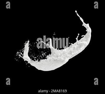 milk or white liquid splash isolated on black background Stock Photo