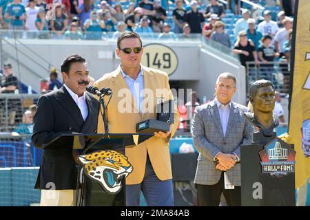 Former Jacksonville Jaguars offensive tackle Tony Boselli, center, stands  with members of his family after a ceremony, where he was presented with  his Pro Football Hall of Fame ring and had his