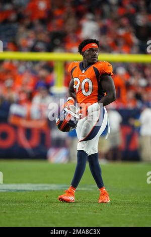 Denver Broncos linebacker Jonathan Kongbo (90) walks off the field