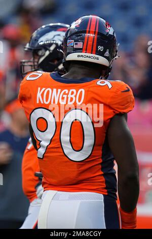 Denver Broncos linebacker Jonathan Kongbo (90) walks off the field after an  NFL football game against the Jacksonville Jaguars at Wembley Stadium in  London, Sunday, Oct. 30, 2022. The Denver Broncos defeated