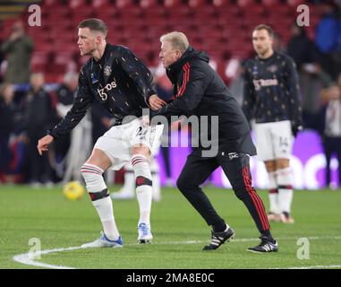London ENGLAND - January 18: L-R Manchester United's Wout Weghorst (on loan from Burnley) tussle with Manchester United Assistant coach Steve McClaren Stock Photo