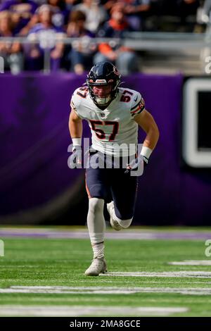 Chicago Bears linebacker Jack Sanborn (57) runs after the ball