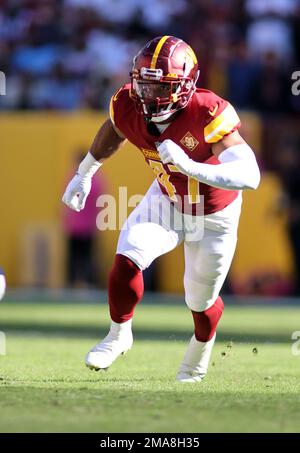 January 8, 2023 : Washington Commanders linebacker Khaleke Hudson (47)  applies pressure to Dallas Cowboys quarterback Dak Prescott (4) during the  game between the Dallas Cowboys and the Washington Commanders in Landover