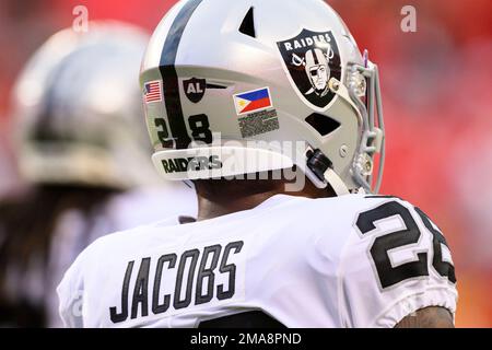 Oakland Raiders running back Josh Jacobs (28) warms up before an