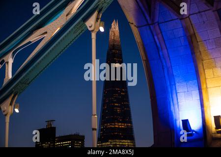 The Shard at night seen from Tower Bridge in London Stock Photo