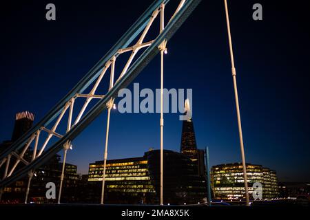 The Shard at night seen from Tower Bridge in London Stock Photo