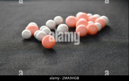 colorful foam seed for absorb delivery stuff arranging on black background Stock Photo