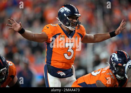 Denver Broncos quarterback Russell Wilson (3) calls a play against the  Indianapolis Colts during the second half of an NFL football game,  Thursday, Oct. 6, 2022, in Denver. (AP Photo/David Zalubowski Stock