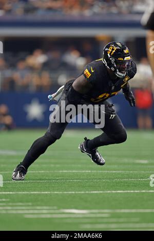 Washington Commanders defensive end Efe Obada (97) runs during an