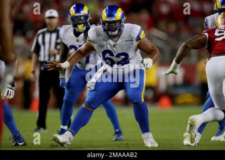 Los Angeles Rams guard Jeremiah Kolone (62) and center Coleman