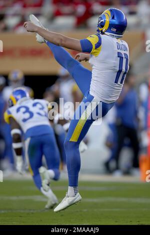 Los Angeles Rams punter Riley Dixon (11) jogs before an NFL