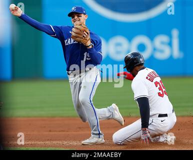 Cleveland Guardians' Oscar Gonzalez hits a single during the third inning  of a baseball game against the Miami Marlins, Sunday, April 23, 2023, in  Cleveland. (AP Photo/Nick Cammett Stock Photo - Alamy