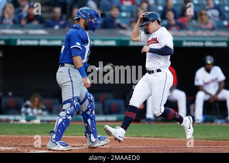 Cleveland Guardians right fielder Will Brennan greets teammates