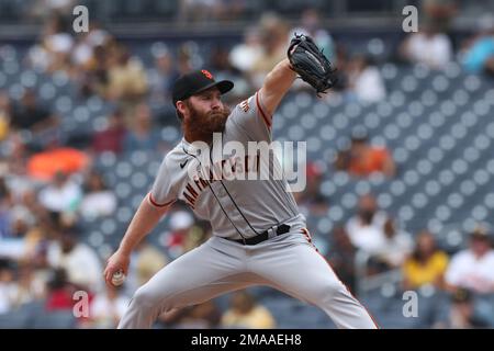 San Francisco Giants starting pitcher John Brebbia winds up against the San  Diego Padres in the first inning of a baseball game Wednesday, Oct. 5, 2022,  in San Diego. (AP Photo/Derrick Tuskan