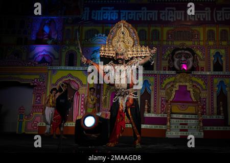 An artist dressed as Ravana performs on a last day of Ramlila ...