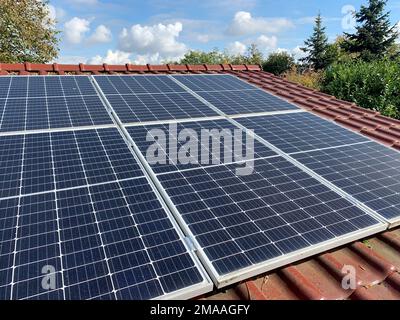 Photovoltaic Panel Solar panel installed on a roof Stock Photo