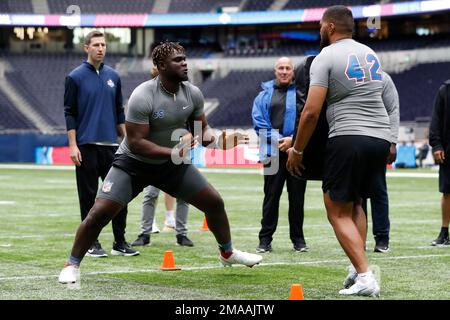 Offensive lineman Basil Chijioke Okoye, of Nigeria, participates in a ...