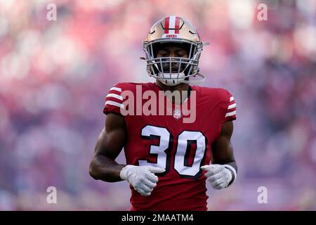 San Francisco 49ers safety George Odum (30) runs after an interception  during an NFL football game against the Arizona Cardinals, Sunday, Jan.8,  2023, in Santa Clara, Calif. (AP Photo/Scot Tucker Stock Photo 