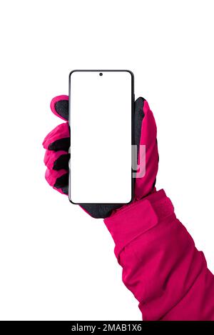 Woman hand with glove holding smart phone in front vertical position. Isolated display and background for mockup Stock Photo