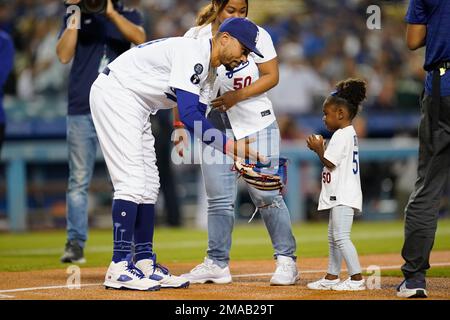 Los Angeles, United States. 17th June, 2021. Los Angeles Dodgers outfielder  Mookie Betts is joined by his mother Diana Benedict and father Willie Betts  prior to the start of the Dodgers MLB