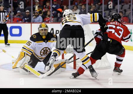 Boston Bruins goaltender Kyle Keyser (85) defends against the New Jersey  Devils in the third period of an NHL preseason hockey game Monday, Oct. 3,  2022, in Newark, N.J. The Devils won