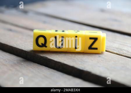 Quiz idea. Written on a yellow cubes. Stock Photo