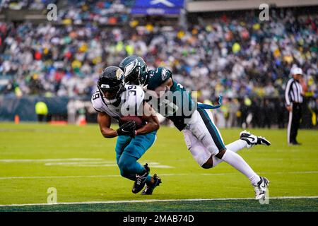 Jacksonville Jaguars' Jamal Agnew scores a touchdown in front of  Philadelphia Eagles' C.J. Gardner-Johnson during the first half of an NFL  football game Sunday, Oct. 2, 2022, in Philadelphia. (AP Photo/Matt Rourke