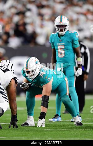 Miami Dolphins offensive tackle Liam Eichenberg (74) walks on the field  during the second half of an NFL football game against the New York Jets,  Sunday, Jan. 8, 2023, in Miami Gardens